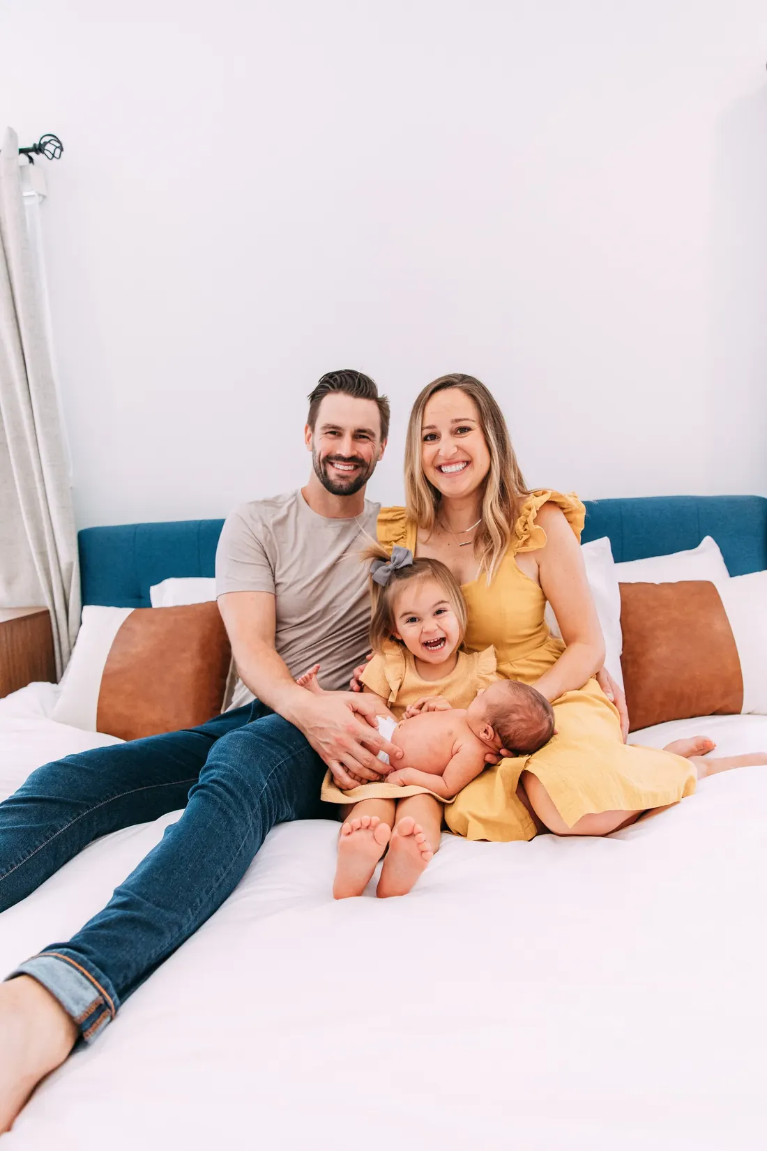 Rachel and Tyler Mounce with their two daughters