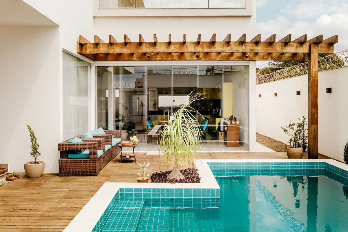 Modern home with a pergola and pool